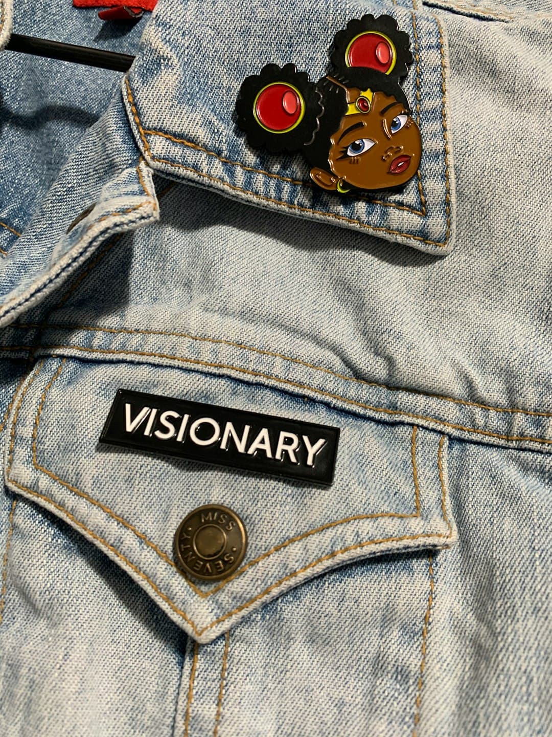 Denim jacket with visionary patch